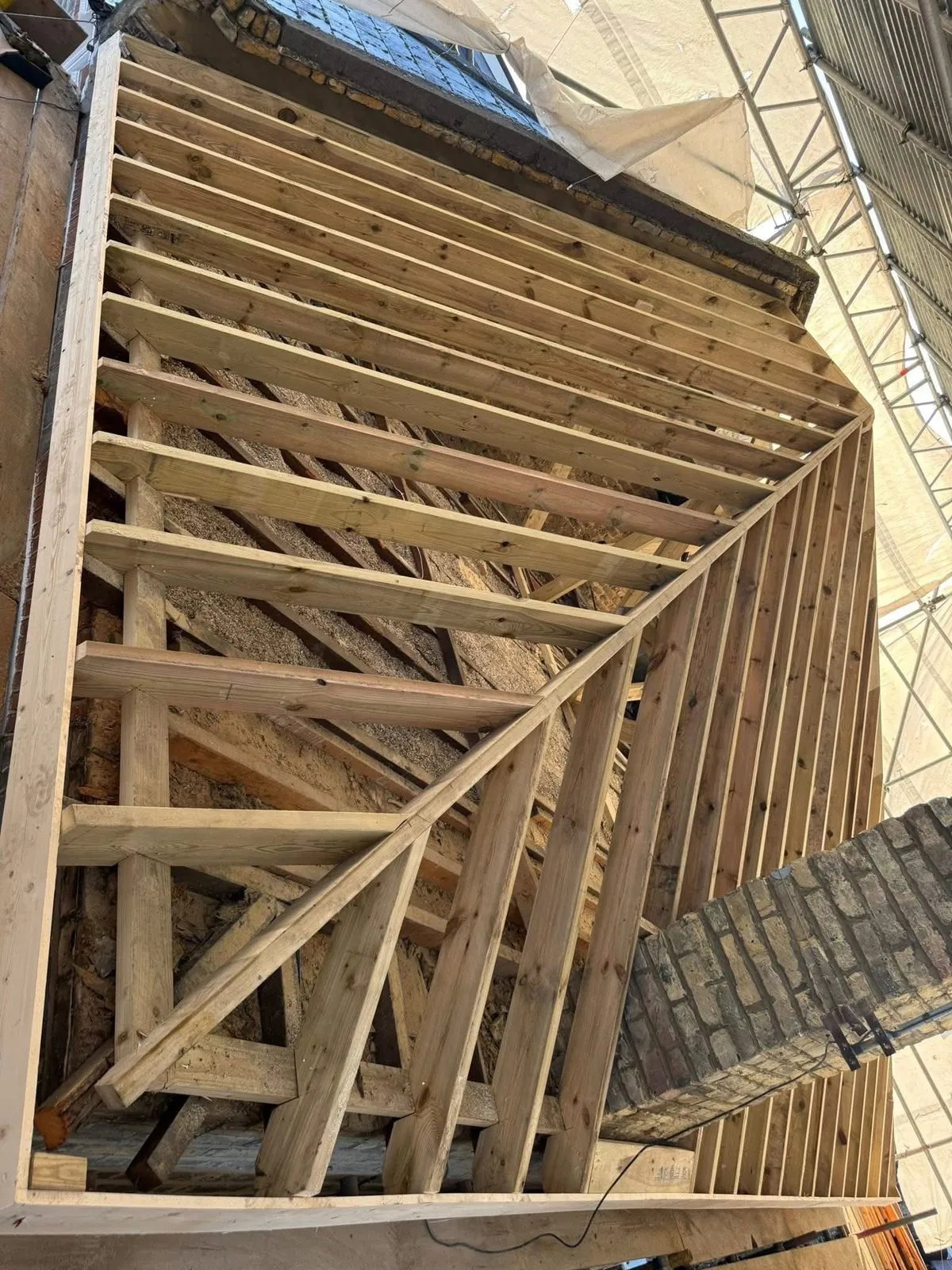 New roof timbers and rafters during a re-roof in Saltash